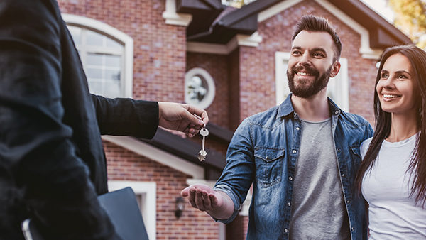 couple securing their first home through mortgage advice